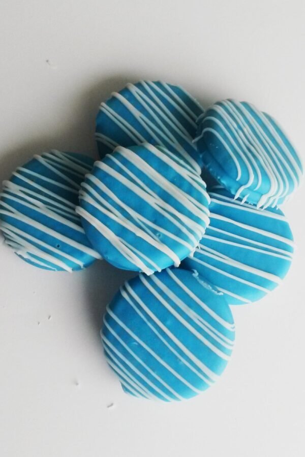 12 Baby Blue Chocolate Covered Oreo Cookies With White Drizzle